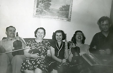 Norman and Ruth (at right) posing with instruments (c.1950)