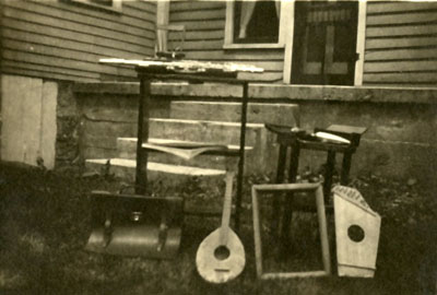 Things Norman made as a kid included a zither-like instrument.